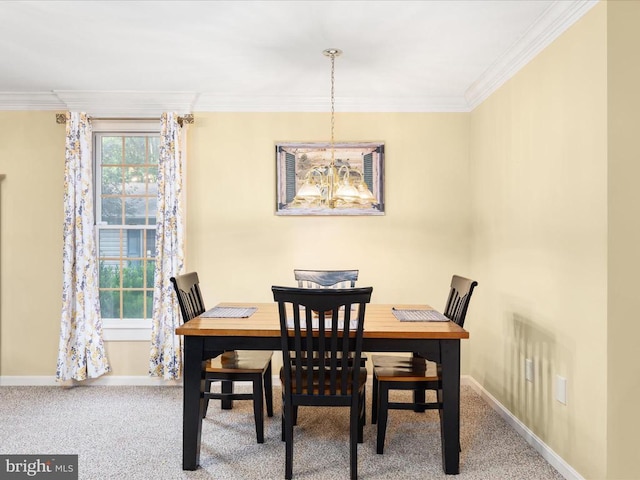 carpeted dining room with crown molding