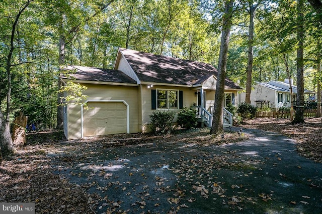 single story home with a garage