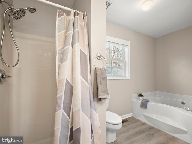 bathroom with a bath, a shower with curtain, toilet, and wood finished floors