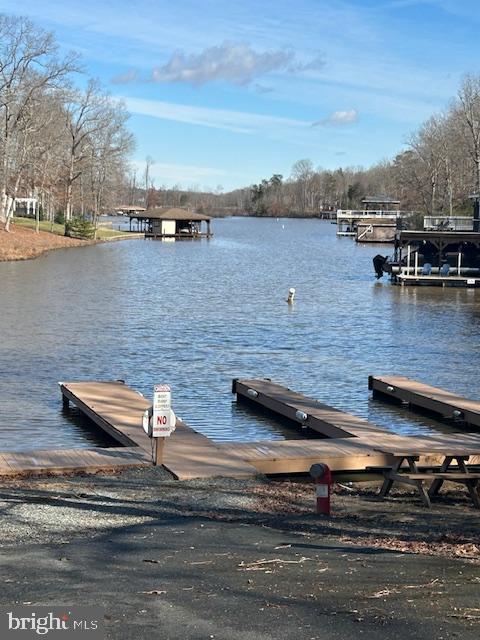 view of dock with a water view