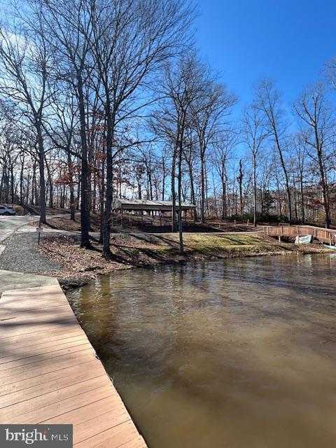 dock area featuring a water view