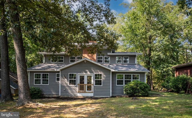 view of front of home with a front yard