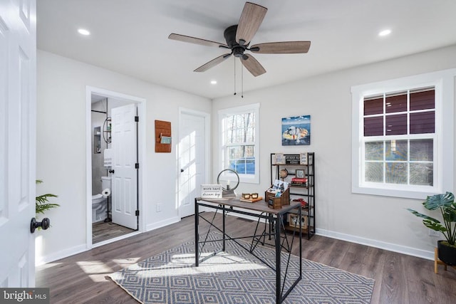 home office featuring recessed lighting, baseboards, and wood finished floors