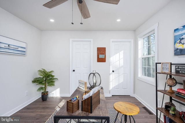 interior space featuring ceiling fan, recessed lighting, wood finished floors, visible vents, and baseboards