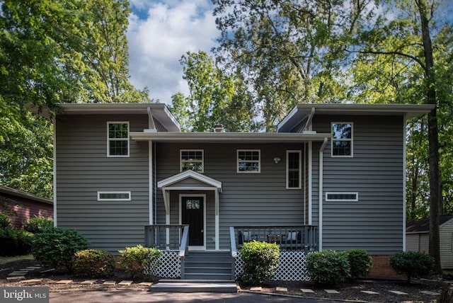 split level home with a porch