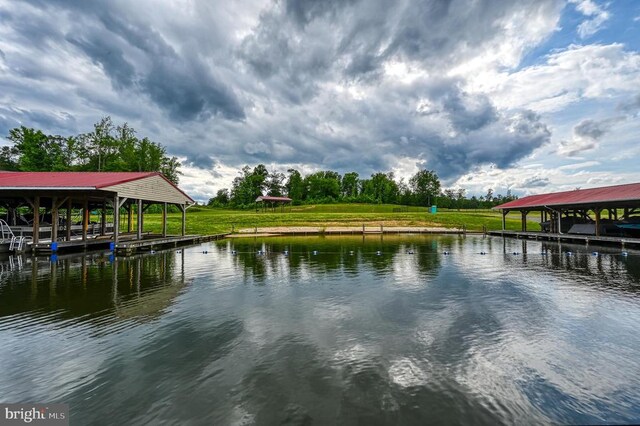 dock area with a water view