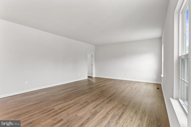 empty room featuring hardwood / wood-style floors