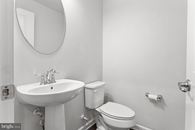 bathroom featuring toilet