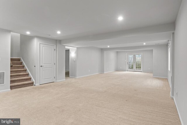 basement with light colored carpet