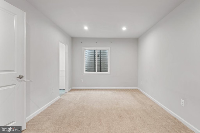 view of carpeted spare room