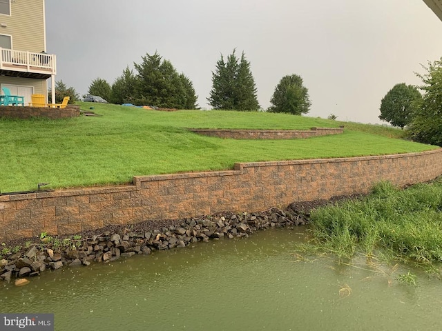 view of yard with a water view