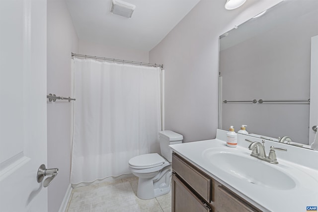 full bath with a shower with curtain, visible vents, vanity, tile patterned floors, and toilet
