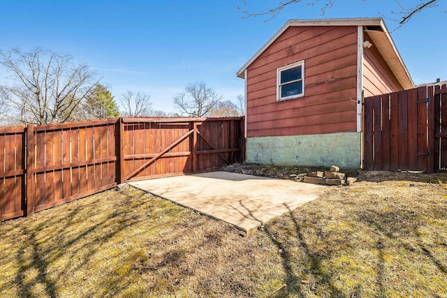 exterior space with fence and a gate