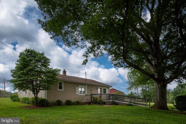 view of yard with a deck