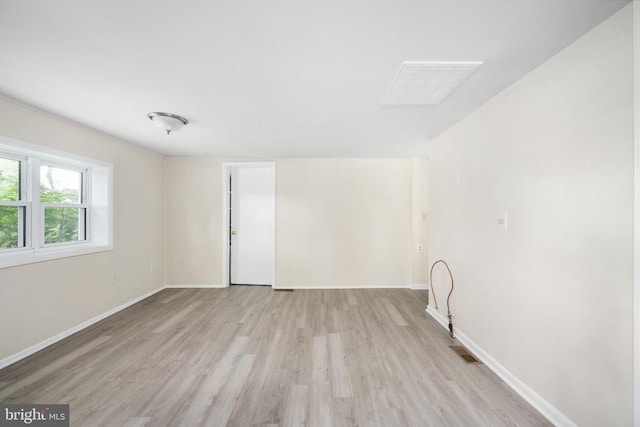 empty room featuring light hardwood / wood-style floors