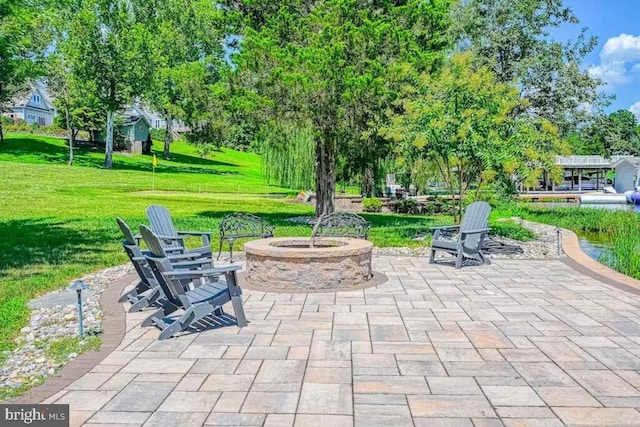 view of patio featuring an outdoor fire pit