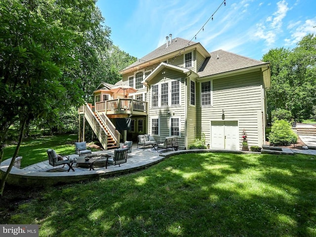 back of property featuring a yard, stairs, a patio, and an outdoor living space with a fire pit