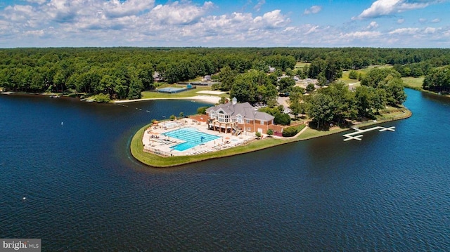 aerial view featuring a water view and a view of trees