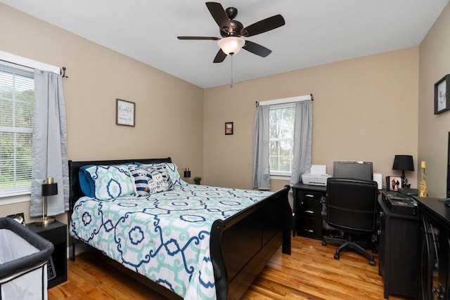 bedroom featuring ceiling fan and light wood-style floors