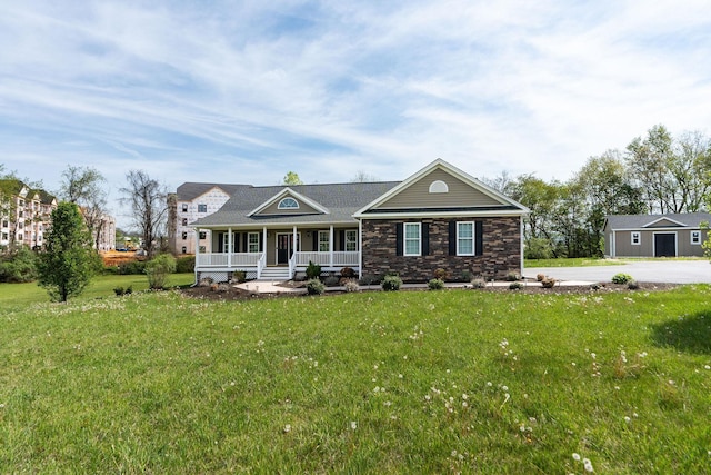 view of front of house featuring a porch and a front yard