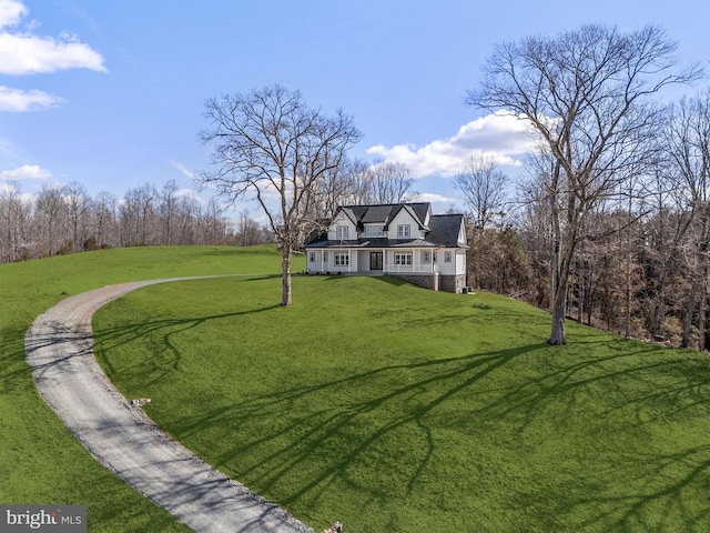 exterior space with a front lawn