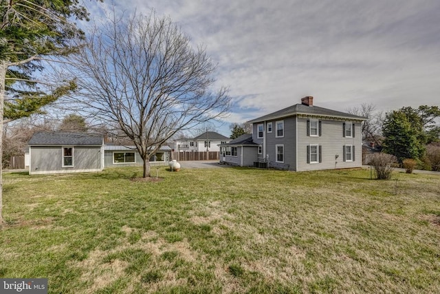 view of yard with fence