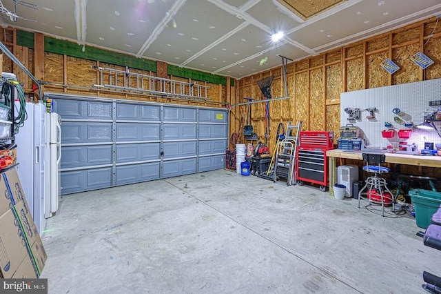 garage featuring a workshop area