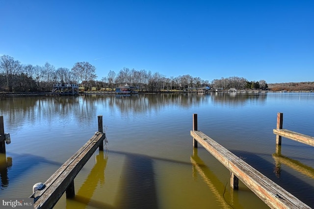 view of dock with a water view