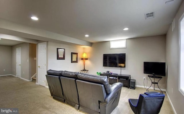 living room featuring visible vents, baseboards, recessed lighting, stairs, and light carpet