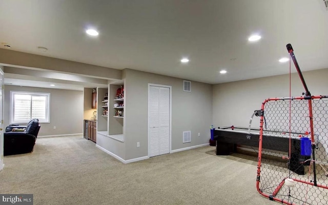 playroom with visible vents, carpet floors, and baseboards