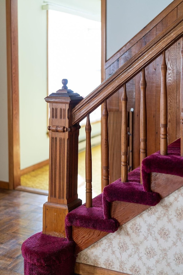 stairway with baseboards