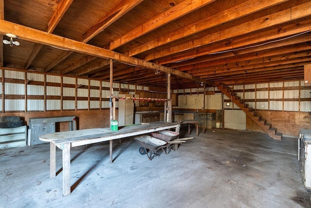 miscellaneous room featuring unfinished concrete floors