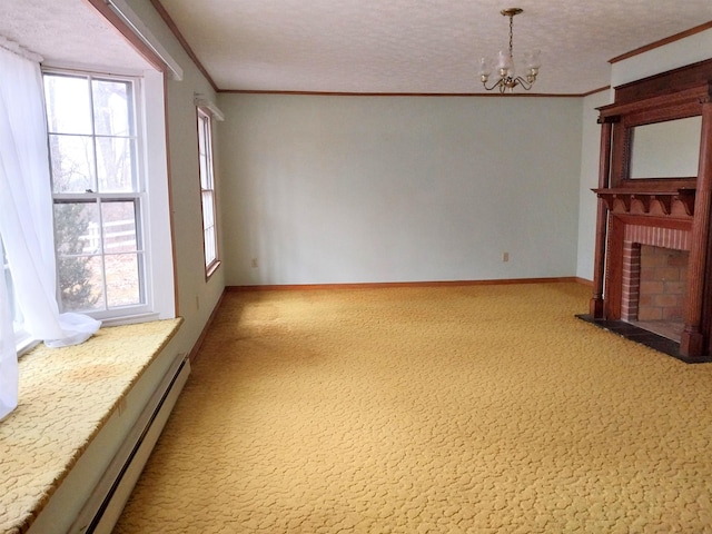 unfurnished living room with ornamental molding, a brick fireplace, carpet flooring, and baseboard heating