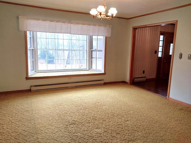 unfurnished room featuring a baseboard heating unit, baseboards, a notable chandelier, and crown molding