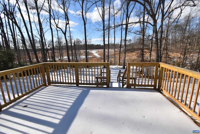 view of snow covered deck