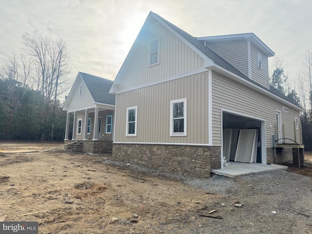 view of home's exterior with a garage