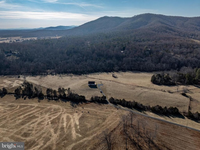 view of mountain feature with a rural view