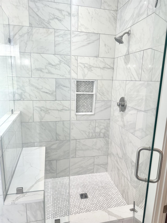 bathroom with an enclosed shower