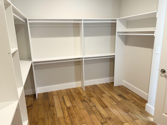 walk in closet featuring light wood-type flooring