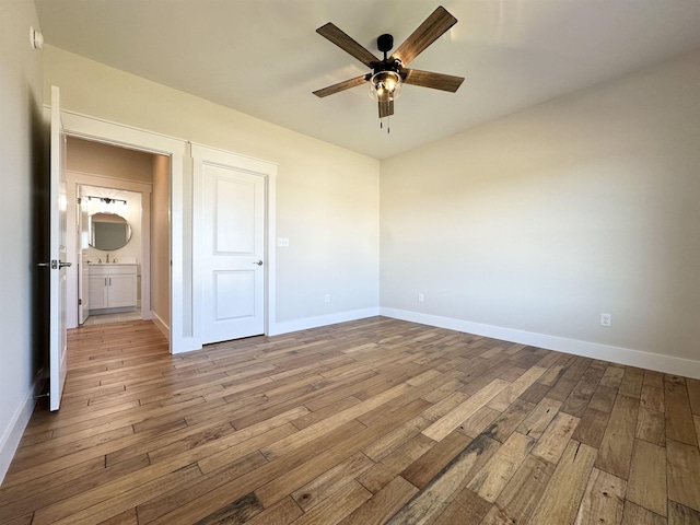 unfurnished bedroom featuring light hardwood / wood-style flooring and ceiling fan