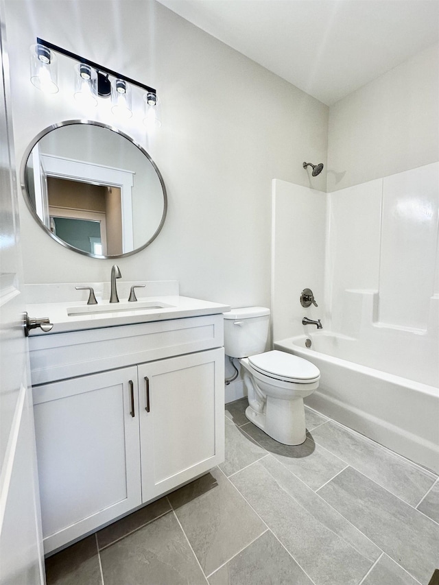 full bathroom featuring vanity, shower / bathtub combination, and toilet