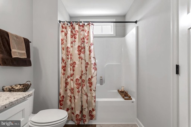 full bathroom with vanity, shower / bath combination with curtain, and toilet