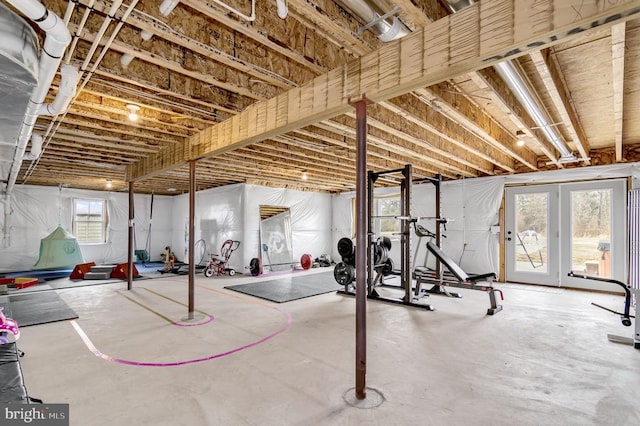 workout room featuring french doors