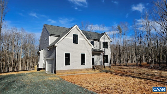 exterior space with a garage