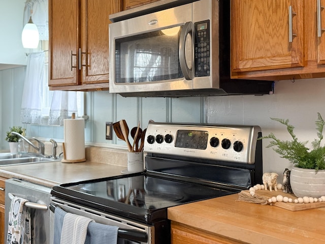 kitchen with sink and stainless steel appliances