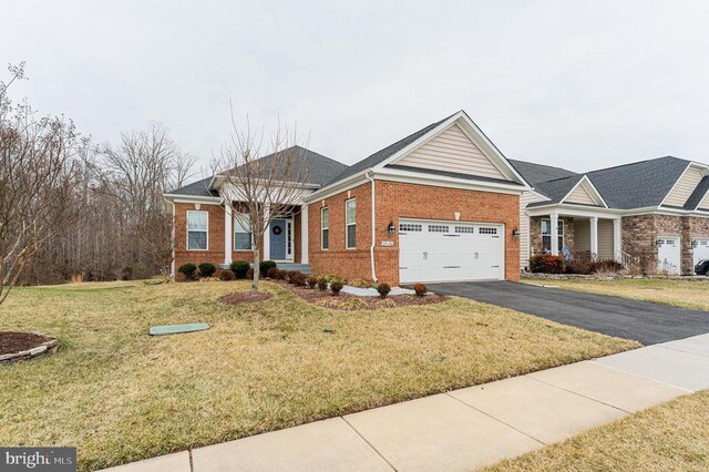 view of front of home with central AC, a garage, and a front yard