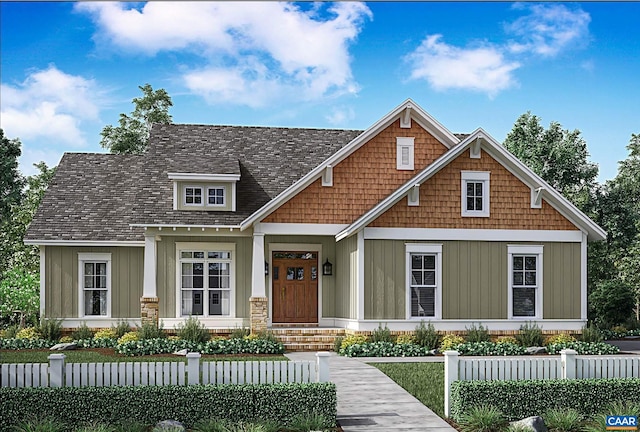 craftsman inspired home with a fenced front yard