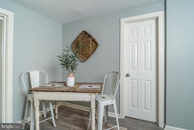 dining area featuring hardwood / wood-style floors