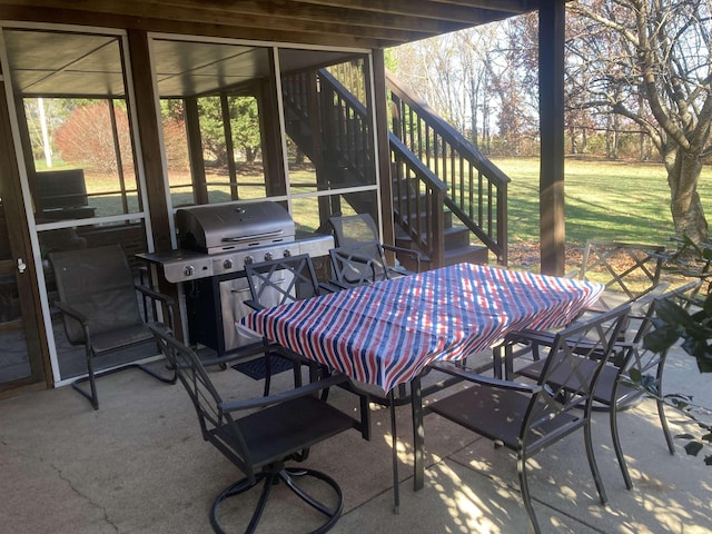 view of patio / terrace featuring stairs and area for grilling