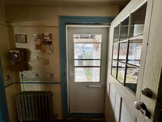 entryway with radiator heating unit